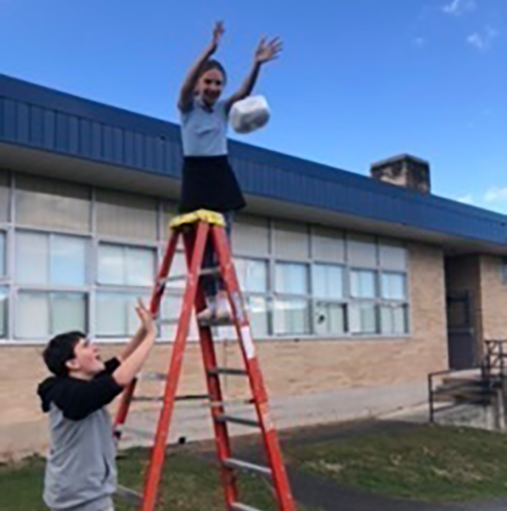 children doing an egg-drop